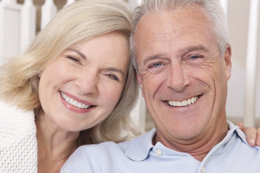 older man and woman smiling 