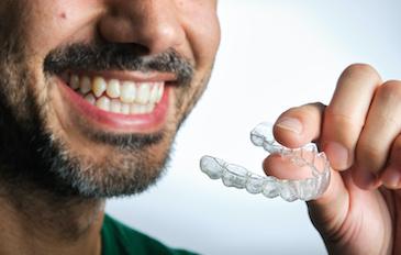 man using invisalign in north york