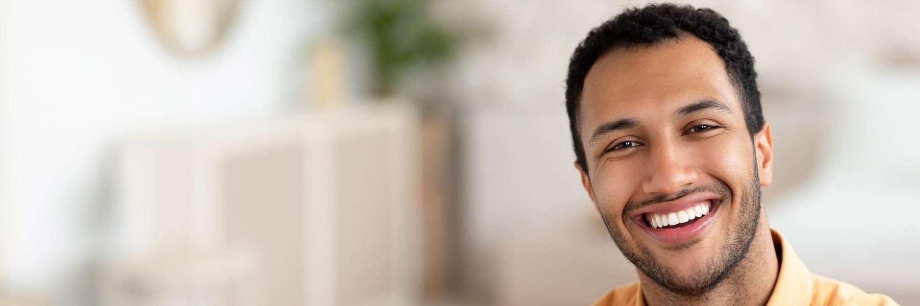 north york man smiling after getting invisalign