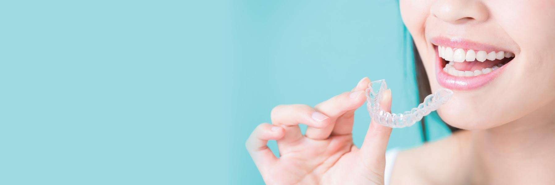woman using invisalign from north york dental office