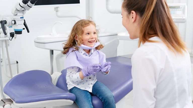 dentist talking to a kid in North York ON