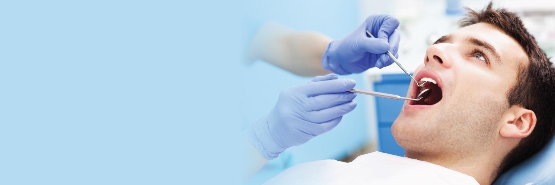 man getting a dental cleaning in North York