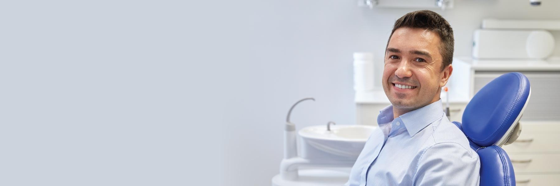 man smiling in dental chair in North York