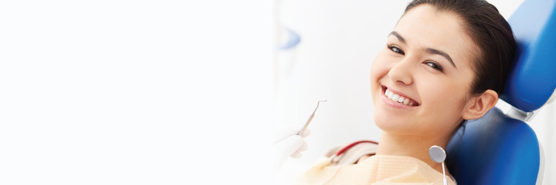woman sitting in dental chair in north york
